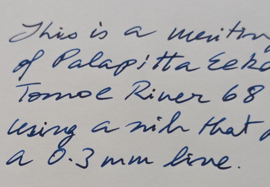 A writing sample of Palapitta Eeka on Tomoe River 68 GSM paper in 0.3mm line width