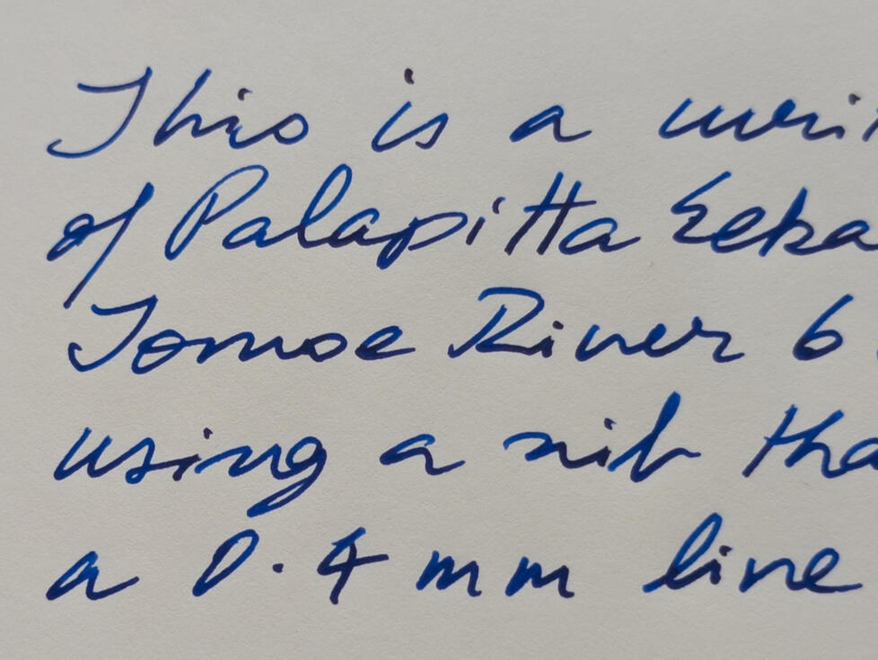 A writing sample of Palapitta Eeka on Tomoe River 68 GSM paper in 0.4mm line width